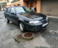 Чорний Деу Нексія, об'ємом двигуна 1.6 л та пробігом 230 тис. км за 1600 $, фото 1 на Automoto.ua