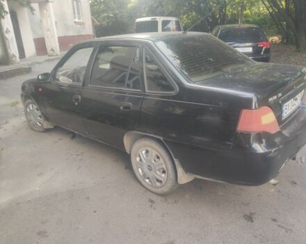 Черный Дэу Нексия, объемом двигателя 1.6 л и пробегом 237 тыс. км за 1300 $, фото 5 на Automoto.ua