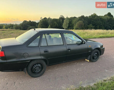 Деу Нексія 2009 у Овруче на Automoto.ua Чорний Деу Нексія, об'ємом двигуна 1.6 л та пробігом 204 тис. км за 2500 $, фото 11 на Automoto.ua