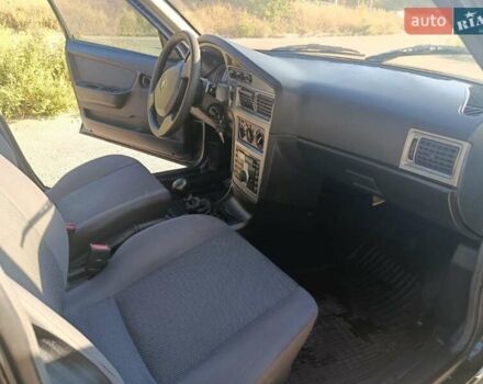 Черный Дэу Нексия, объемом двигателя 1.6 л и пробегом 122 тыс. км за 2400 $, фото 3 на Automoto.ua