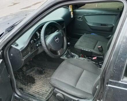 Чорний Деу Нексія, об'ємом двигуна 1.5 л та пробігом 334 тис. км за 1400 $, фото 6 на Automoto.ua