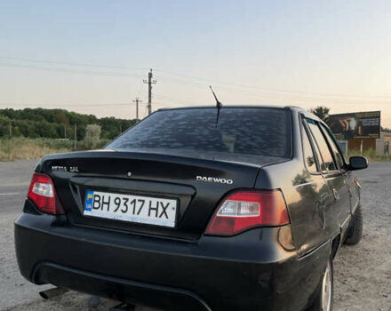 Черный Дэу Нексия, объемом двигателя 1.6 л и пробегом 177 тыс. км за 2500 $, фото 4 на Automoto.ua