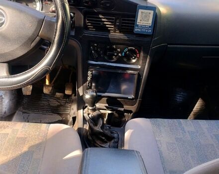 Чорний Деу Нексія, об'ємом двигуна 1.5 л та пробігом 102 тис. км за 2400 $, фото 4 на Automoto.ua