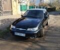 Чорний Деу Нексія, об'ємом двигуна 1.5 л та пробігом 103 тис. км за 2450 $, фото 1 на Automoto.ua