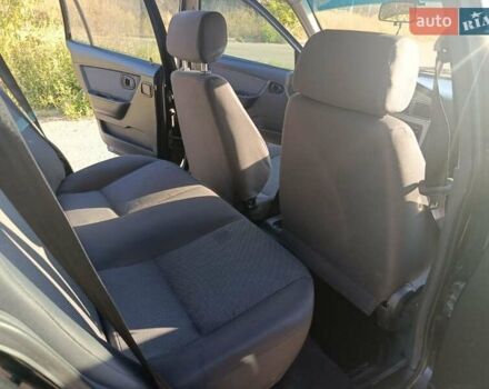 Черный Дэу Нексия, объемом двигателя 1.6 л и пробегом 122 тыс. км за 2400 $, фото 5 на Automoto.ua