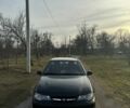 Чорний Деу Нексія, об'ємом двигуна 1.5 л та пробігом 141 тис. км за 2500 $, фото 1 на Automoto.ua