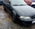 Черный Дэу Нексия, объемом двигателя 1.5 л и пробегом 407 тыс. км за 1150 $, фото 1 на Automoto.ua