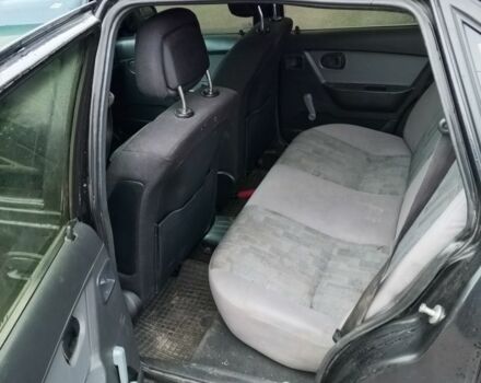 Чорний Деу Нексія, об'ємом двигуна 1.5 л та пробігом 334 тис. км за 1400 $, фото 5 на Automoto.ua