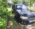 Чорний Деу Нексія, об'ємом двигуна 1.6 л та пробігом 250 тис. км за 2000 $, фото 4 на Automoto.ua