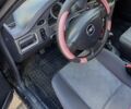 Чорний Деу Нексія, об'ємом двигуна 1.5 л та пробігом 121 тис. км за 2000 $, фото 1 на Automoto.ua