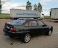 Чорний Деу Нексія, об'ємом двигуна 1.5 л та пробігом 180 тис. км за 1800 $, фото 1 на Automoto.ua