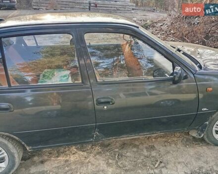 Чорний Деу Нексія, об'ємом двигуна 1.5 л та пробігом 240 тис. км за 950 $, фото 3 на Automoto.ua