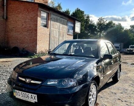 Деу Нексія 2011 у Вінниці на Automoto.ua Чорний Деу Нексія, об'ємом двигуна 1.6 л та пробігом 95 тис. км за 2200 $, фото 5 на Automoto.ua