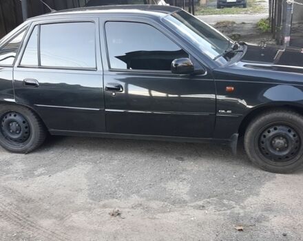 Чорний Деу Нексія, об'ємом двигуна 1.5 л та пробігом 98 тис. км за 4000 $, фото 6 на Automoto.ua