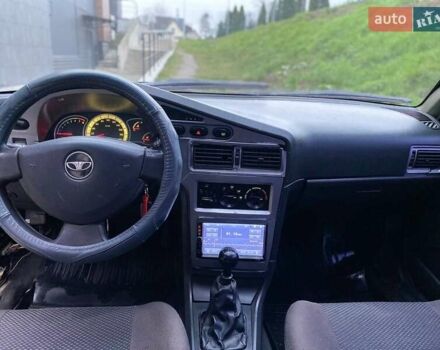 Черный Дэу Нексия, объемом двигателя 1.5 л и пробегом 184 тыс. км за 2350 $, фото 26 на Automoto.ua