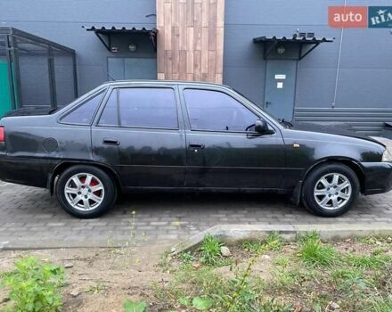 Черный Дэу Нексия, объемом двигателя 1.5 л и пробегом 184 тыс. км за 2350 $, фото 10 на Automoto.ua