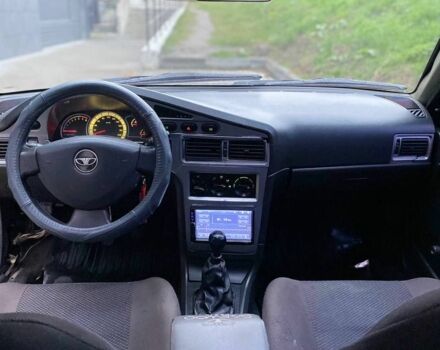 Черный Дэу Нексия, объемом двигателя 1.5 л и пробегом 184 тыс. км за 2350 $, фото 4 на Automoto.ua