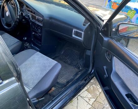 Чорний Деу Нексія, об'ємом двигуна 1.5 л та пробігом 400 тис. км за 870 $, фото 4 на Automoto.ua