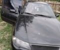 Чорний Деу Нексія, об'ємом двигуна 1.6 л та пробігом 100 тис. км за 2600 $, фото 1 на Automoto.ua