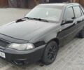 Чорний Деу Нексія, об'ємом двигуна 1.5 л та пробігом 160 тис. км за 3300 $, фото 1 на Automoto.ua