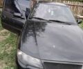 Черный Дэу Нексия, объемом двигателя 1.6 л и пробегом 100 тыс. км за 2600 $, фото 1 на Automoto.ua
