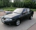 Чорний Деу Нексія, об'ємом двигуна 1.5 л та пробігом 180 тис. км за 1800 $, фото 4 на Automoto.ua