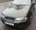 Чорний Деу Нексія, об'ємом двигуна 1.6 л та пробігом 119 тис. км за 2300 $, фото 1 на Automoto.ua