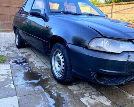 Чорний Деу Нексія, об'ємом двигуна 1.5 л та пробігом 400 тис. км за 870 $, фото 2 на Automoto.ua