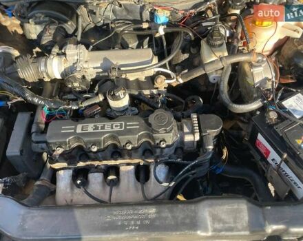 Деу Нексія 2011 у Змиеве на Automoto.ua Чорний Деу Нексія, об'ємом двигуна 1.5 л та пробігом 248 тис. км за 1100 $, фото 5 на Automoto.ua