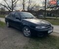 Чорний Деу Нексія, об'ємом двигуна 1.6 л та пробігом 169 тис. км за 1700 $, фото 1 на Automoto.ua