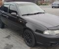 Чорний Деу Нексія, об'ємом двигуна 1.5 л та пробігом 160 тис. км за 3300 $, фото 2 на Automoto.ua