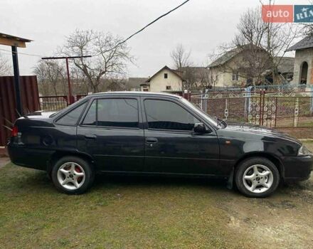 Черный Дэу Нексия, объемом двигателя 1.5 л и пробегом 252 тыс. км за 2300 $, фото 1 на Automoto.ua