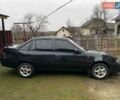 Черный Дэу Нексия, объемом двигателя 1.5 л и пробегом 252 тыс. км за 2300 $, фото 1 на Automoto.ua