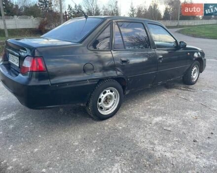 Деу Нексія 2011 у Змиеве на Automoto.ua Чорний Деу Нексія, об'ємом двигуна 1.5 л та пробігом 248 тис. км за 1100 $, фото 2 на Automoto.ua