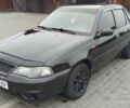 Чорний Деу Нексія, об'ємом двигуна 1.5 л та пробігом 160 тис. км за 3300 $, фото 1 на Automoto.ua