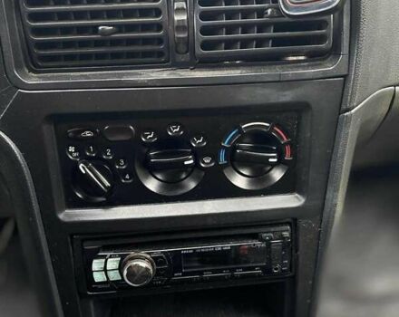 Черный Дэу Нексия, объемом двигателя 1.5 л и пробегом 252 тыс. км за 2300 $, фото 5 на Automoto.ua