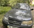 Черный Дэу Нексия, объемом двигателя 1.5 л и пробегом 300 тыс. км за 674 $, фото 1 на Automoto.ua