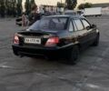 Черный Дэу Нексия, объемом двигателя 1.5 л и пробегом 153 тыс. км за 1900 $, фото 3 на Automoto.ua