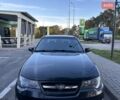 Черный Дэу Нексия, объемом двигателя 1.6 л и пробегом 157 тыс. км за 3000 $, фото 1 на Automoto.ua