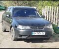 Черный Дэу Нексия, объемом двигателя 1.5 л и пробегом 220 тыс. км за 2000 $, фото 1 на Automoto.ua