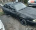 Черный Дэу Нексия, объемом двигателя 1.6 л и пробегом 236 тыс. км за 850 $, фото 1 на Automoto.ua
