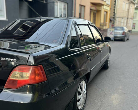 Чорний Деу Нексія, об'ємом двигуна 1.5 л та пробігом 138 тис. км за 2550 $, фото 3 на Automoto.ua
