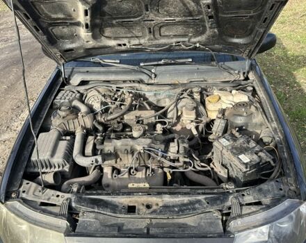 Чорний Деу Нексія, об'ємом двигуна 1.5 л та пробігом 231 тис. км за 1500 $, фото 5 на Automoto.ua