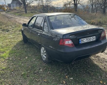 Чорний Деу Нексія, об'ємом двигуна 1.5 л та пробігом 231 тис. км за 1500 $, фото 3 на Automoto.ua