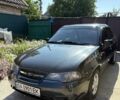 Черный Дэу Нексия, объемом двигателя 1.6 л и пробегом 92 тыс. км за 3700 $, фото 1 на Automoto.ua