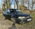 Чорний Деу Нексія, об'ємом двигуна 1.5 л та пробігом 231 тис. км за 1500 $, фото 1 на Automoto.ua