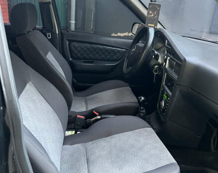 Чорний Деу Нексія, об'ємом двигуна 1.5 л та пробігом 138 тис. км за 2550 $, фото 7 на Automoto.ua