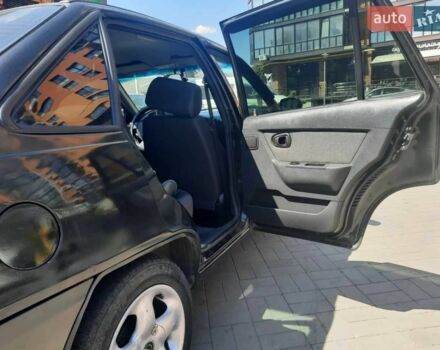 Чорний Деу Нексія, об'ємом двигуна 1.5 л та пробігом 152 тис. км за 2550 $, фото 7 на Automoto.ua