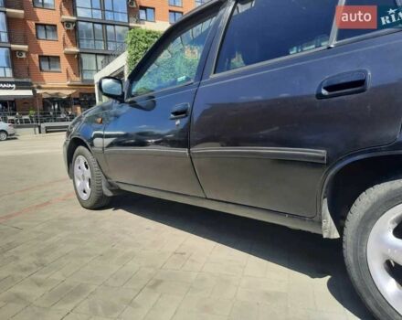 Чорний Деу Нексія, об'ємом двигуна 1.5 л та пробігом 152 тис. км за 2550 $, фото 2 на Automoto.ua