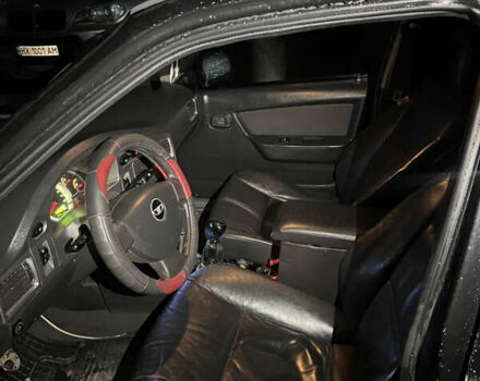 Чорний Деу Нексія, об'ємом двигуна 1.6 л та пробігом 201 тис. км за 1799 $, фото 5 на Automoto.ua